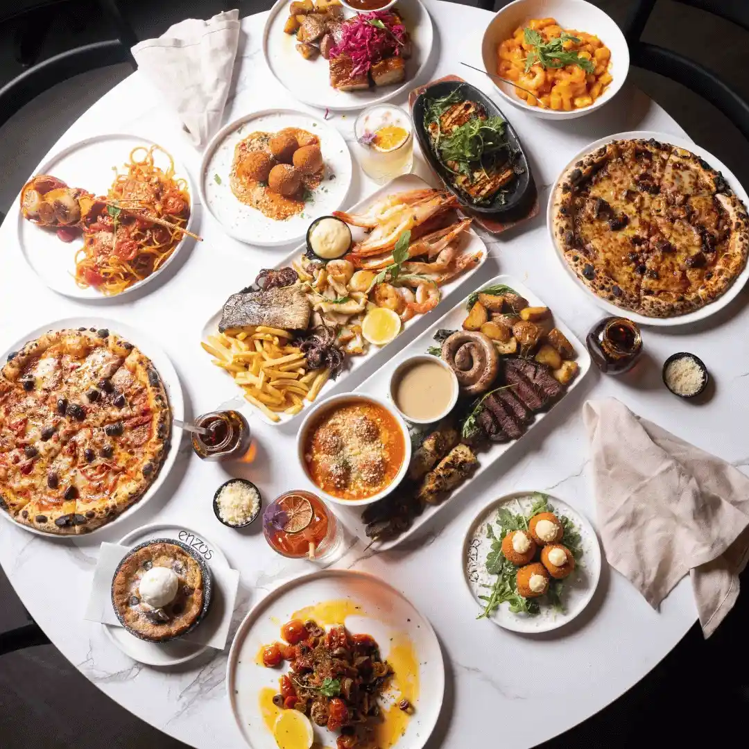 Feast of pizzas, pasta, and platters at Enzo's Cucina Tallawong.